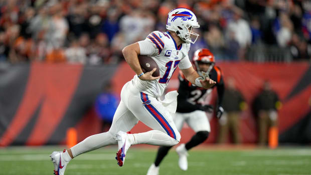 Buffalo Bills quarterback Josh Allen (17) carries the ball in the first quarter of a Week 17 NFL game against the Cincinnati Bengals, Monday, Jan. 2, 2023, at Paycor Stadium in Cincinnati.